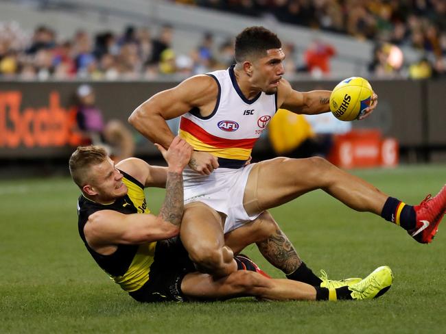 Curtly Hampton of the Crows is tackled by Brandon Ellis. (Photo by Michael Willson/AFL Media/Getty Images)