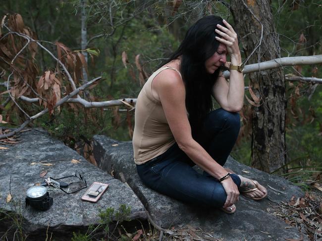Chad Robinson’s girlfriend Rani Morris can’t contain her sadness at the scene of his crashed car in Kenthurst. Picture: Adam Taylor