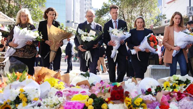 Prime Minister Anthony Albanese accompanies NSW Premier Chris Minns to pay their respects outside the shopping centre. Picture: John Feder/The Australian