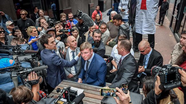 Blair Cottrell, Neil Erikson and Christopher Shortis speak to the media after a court appearance last year. Picture: Jake Nowakowski