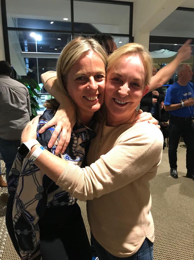 Angie Bell celebrates her victory in the seat of Moncrieff with her campaign manager Ros Bates.