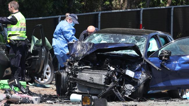 Police at the scene of a fatal crash at the intersection of Castle Hill Drive and Dohles Rocks Road at Murrumba Downs on Thursday. Picture: Lachie Millard