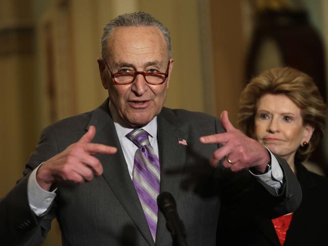 WASHINGTON, DC - MARCH 08: U.S. Senate Majority Leader Sen. Chuck Schumer (D-NY) (L) speaks as Sen. Debbie Stabenow (D-MI) (R) listens during a news briefing after a weekly Senate Democratic policy luncheon at the U.S. Capitol March 8, 2022 in Washington, DC. Senate Democrats gathered for a weekly policy luncheon to discuss Democratic agenda.   Alex Wong/Getty Images/AFP == FOR NEWSPAPERS, INTERNET, TELCOS & TELEVISION USE ONLY ==