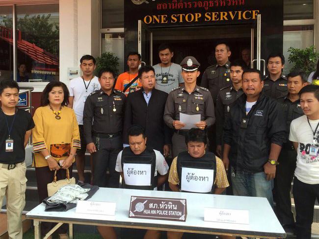 Police surround two suspects arrested over the Owen family bashing. Picture: Hua Hin Police