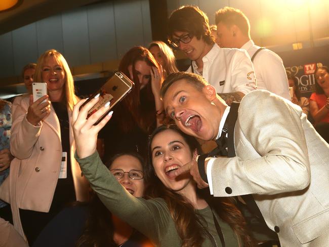 Grant Denyer with fans on the red carpet for the 2017 Logies at Crown Casino. Picture: Hamish Blair