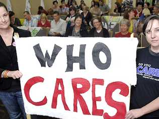 HELPING THE COMMUNITY: Renae Green (left) of Red Inc, and Naomi Worrall of North Coast Community Housing support at the Australian Services Union pay increase rally at the Lismore Workers Club. Picture: David Nielsen