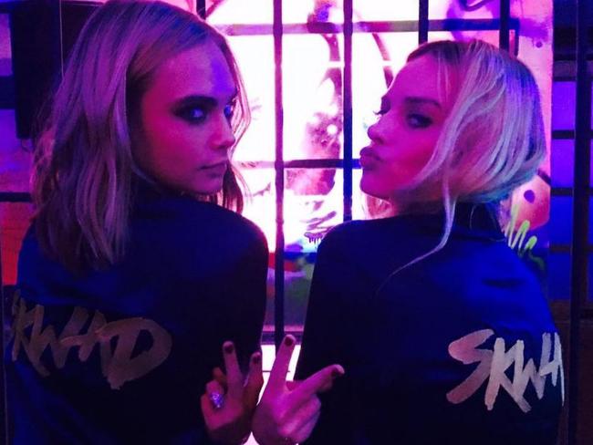 Cara Delevigne and Margot Robbie twinning in matching tracksuits at the Suicide Squad after-party in London. Picture: Instagram