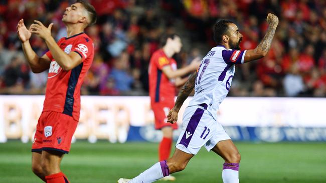 Diego Castro celebrates after opening the scoring for Perth Glory against Adelaide United at Coopers Stadium. Picture: AAP