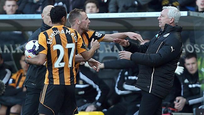 Newcastle’s Alan Pardew (right) appeared to take umbrage when Hull’s David Meyler (third left) pushed him to recover the ball as the hosts tried to get back into the game at 3-1 down during the second-half. Picture: Lynne Cameron