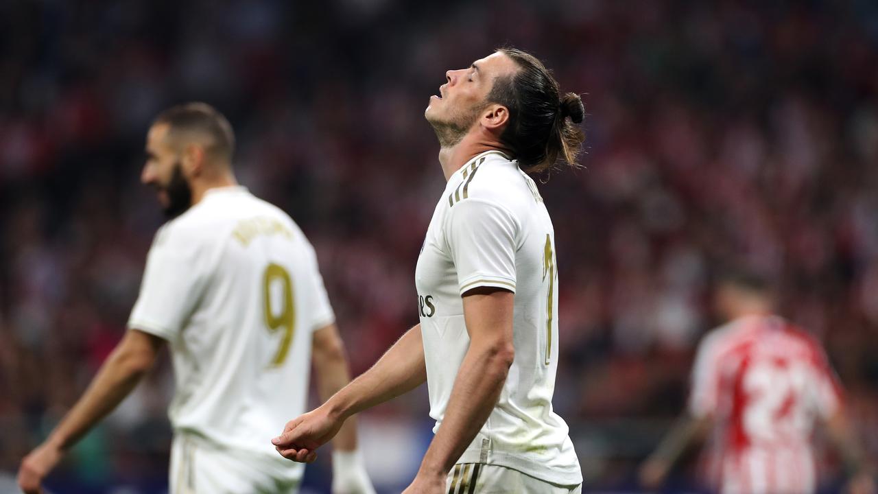 Real Madrid Midfielder, Gareth Frank Bale - BALE, number 11 celebrates with  James Rodriguez after