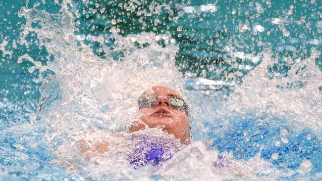 Kaylee McKeown competes during her record-breaking swim. Picture: AFP