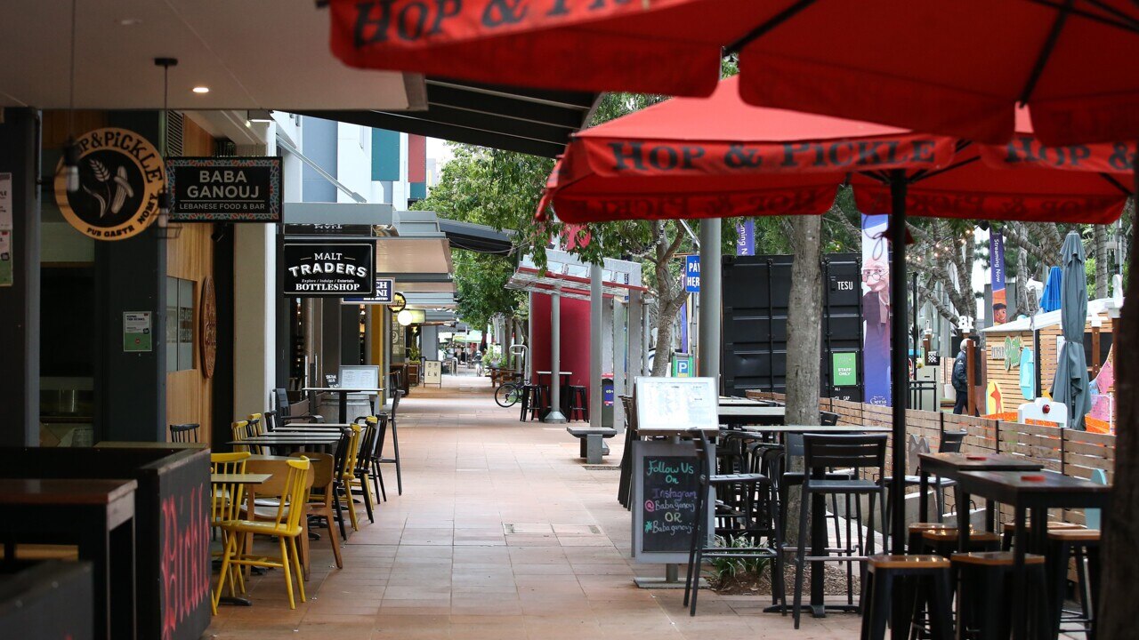 Greater Brisbane residents await today's lockdown decision