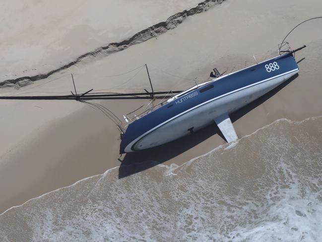 Tasmanian-owned yacht, the Huntress, washed up on Cape Barren Island on January 4 after being adrift at sea for several days when it was damaged during the 2022 Sydney to Hobart yacht race. Pic was taken January 5. Picture; Aboriginal Land Council Tasmania.