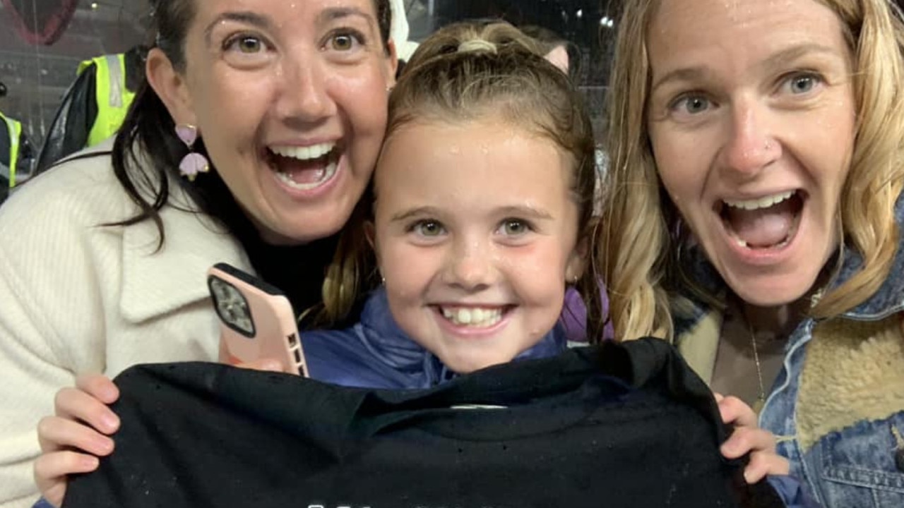 Ed Sheeran gifts encore t-shirt to lucky young fan Rhea, pictured with her mum (left) Samantha Huntley and aunty (right) Kathryn Williams.