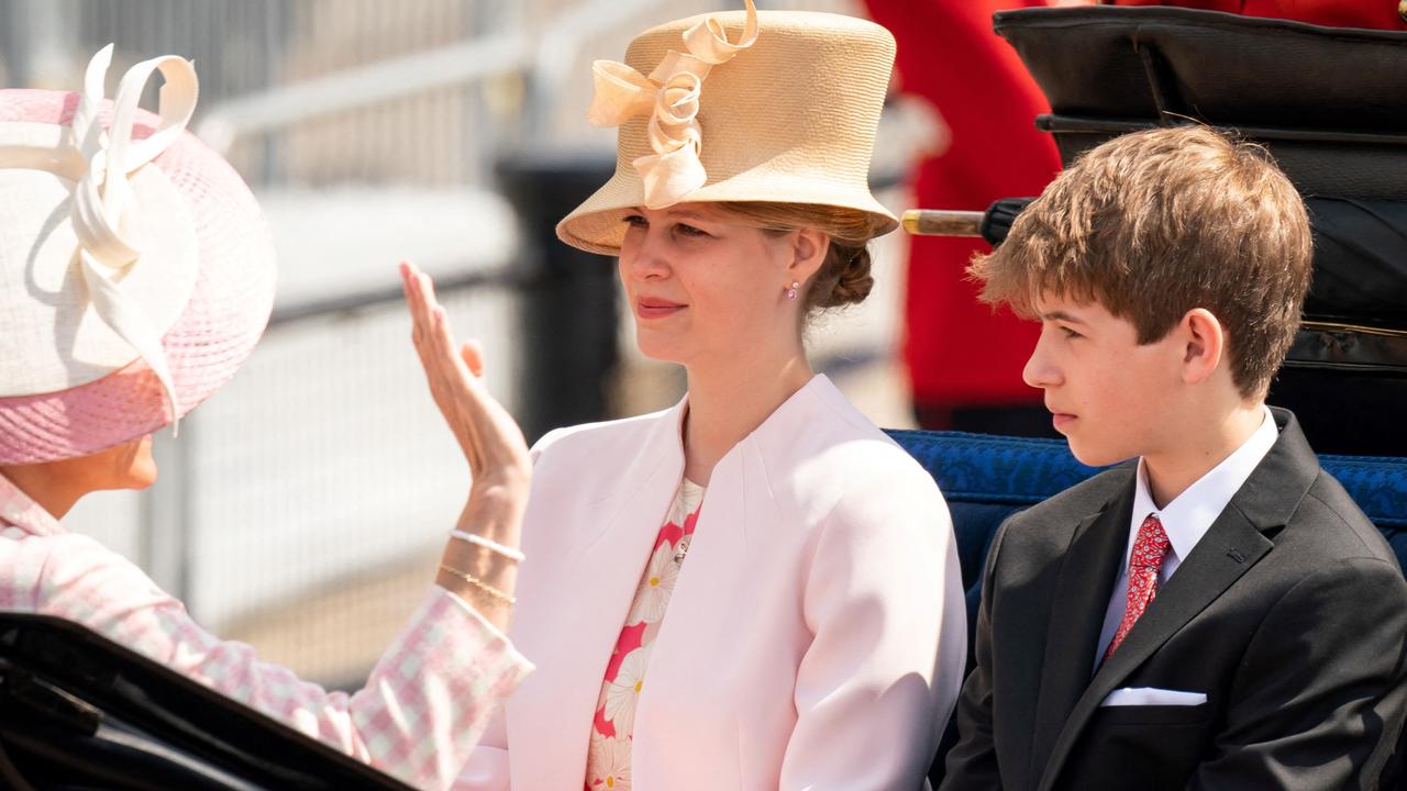 Britain's Sophie, Countess of Wessex (L), Britain's Lady Louise Windsor (C) and James, Viscount Severn travel in a horse-drawn carriage during the Queen's Birthday Parade. Picture: Aaron Chown / AFP