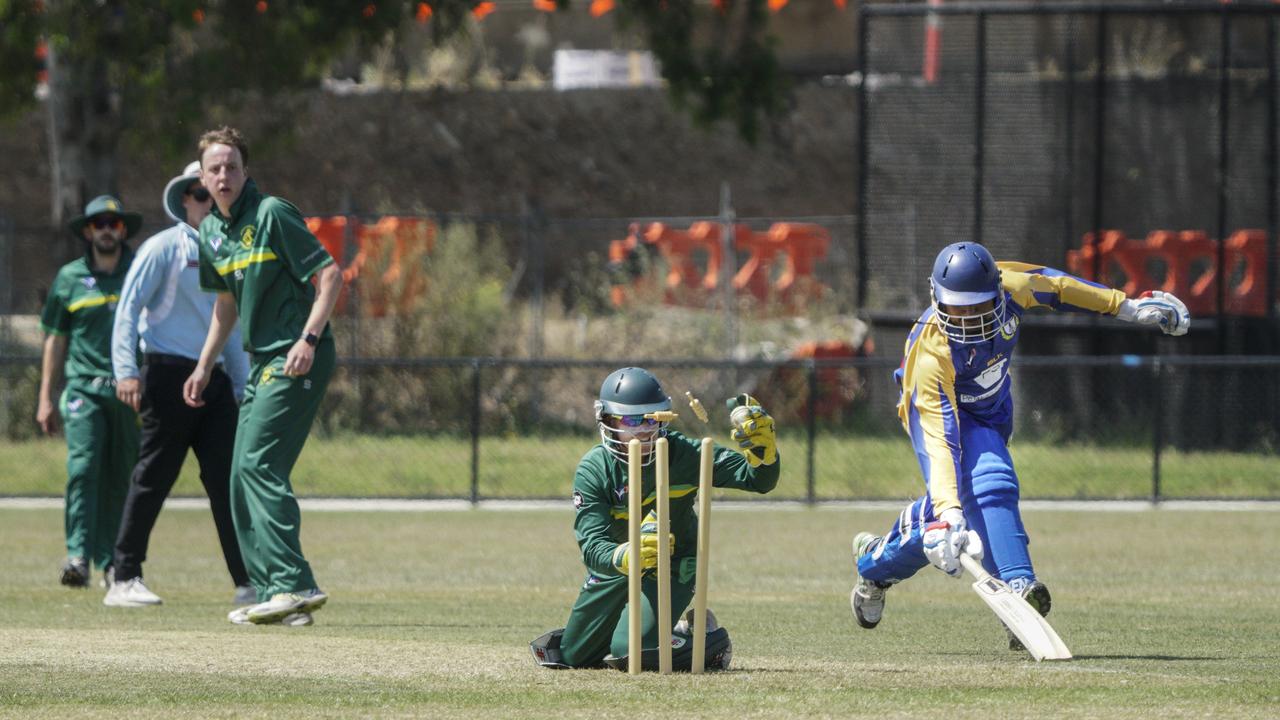 That’s a close one between Spotswood keeper Ross Horkings and Noble Park batsman Kolitha Weerasekera. Picture: Valeriu Campan