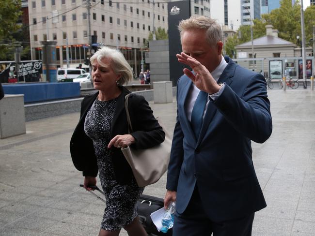 CEO and Senior Financial Advisor at Henderson Maxwell, Sam Henderson (right) arrives at the Federal Court in Melbourne, Tuesday, April 24, 2018. The financial services royal commission public hearing into financial advice continues in Melbourne. (AAP Image/Stefan Postles) NO ARCHIVING