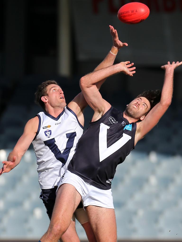 Vic Country’s Sam Michael and VAFA’s Antony Forato at Ikon Park, Carlton. Picture: Yuri Kouzmin