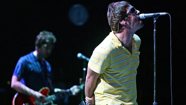 Noel (left) and Liam Gallagher of Oasis in 2005. The British rock legends will reunite for a world tour next year. Picture: Jose Jordan/AFP