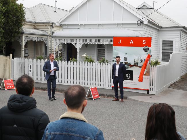 Tate Moore auctioneer. Seddon couple Tam and Anthony Bulloch, who abandoned plans to sell their home as Melbourne's tough, weeks long stage-four lockdown tanked the city's property market have sold their home today. Saturday, FEBRUARY 27, 2021. Picture: David Crosling