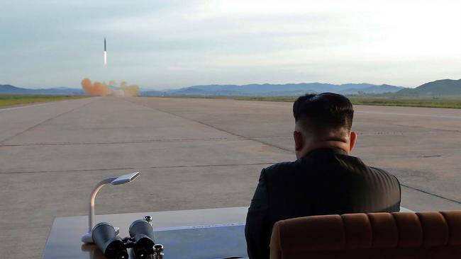 North Korean leader Kim Jong-Un inspecting a launching drill of the medium-and-long range strategic ballistic rocket Hwasong-12. He has today threatened to stage an “unimaginable” strike on the United States.  Picture: KCNA via KNS