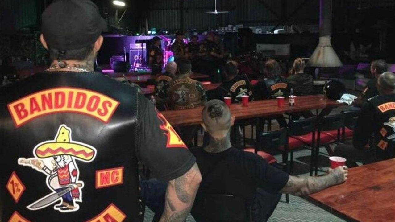 Photos posted to social media show members of the Bandidos bikie gang visiting the camp.