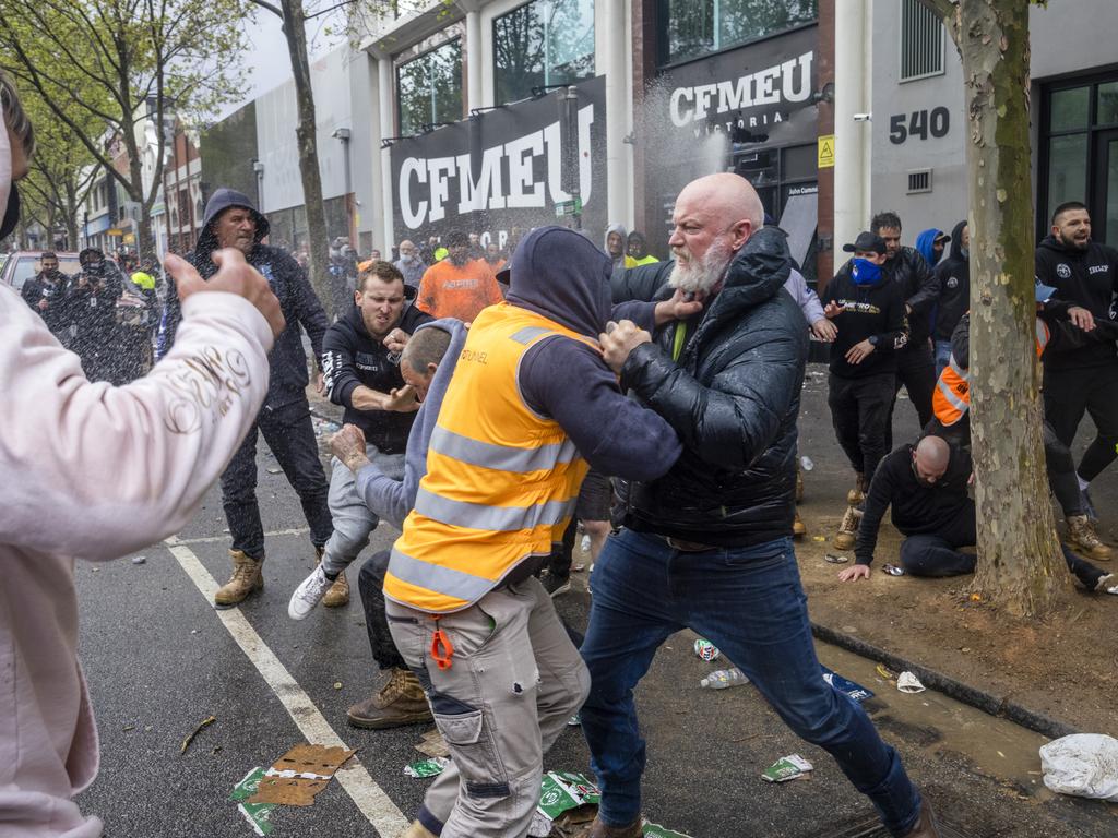 Men brawl outside the CFMEU headquarters during a protest about mandatory vaccination in the construction industry. Picture: David Geraghty