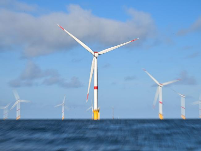 This photograph taken on October 18, 2024 shows a wind farm, off Fecamp, northern France. (Photo by Lou BENOIST / AFP)