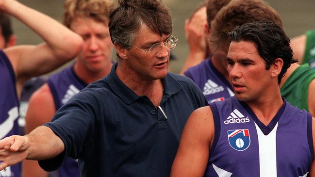 New Fremantle Dockers AFL coach Damien Drum talks to players during scratch match at training, 22/01/99.Australian Rules nud