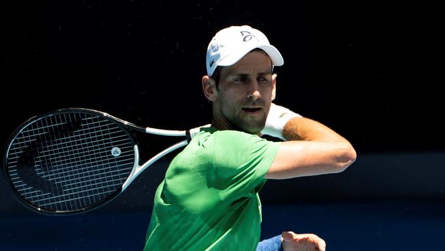 Novak Djokovic practises at Melbourne Park while his participation in the Australian Open remains in doubt Picture: AFP