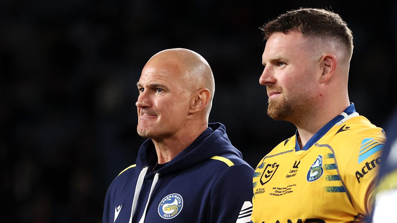 Eels coach Brad Arthur and Nathan Brown of the Eels look dejected after defeat in the 2022 NRL Grand Final match between the Penrith Panthers and the Parramatta Eels at Accor Stadium on October 02, 2022, in Sydney, Australia.