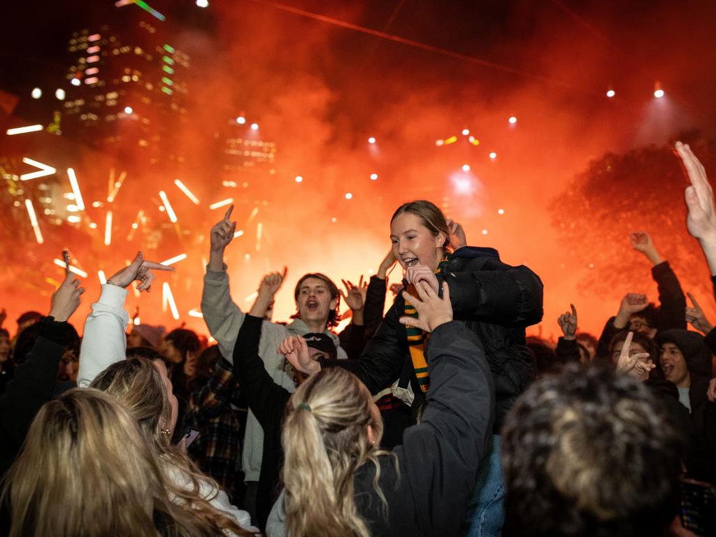 Fans at Federation Square react after Australia scored its only goal in the semi-final against England’s Lionesses. Picture: Darrian Traynor/Getty Images
