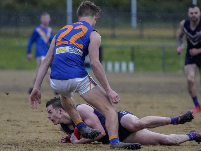 EFL: Cameron Williams gets down for Templestowe. Picture: Valeriu Campan