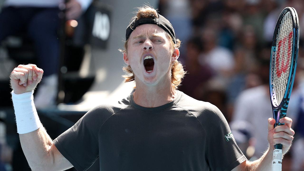 Australia's Dane Sweeny reacts after winning the fourth set against Argentina's Francisco Cerundolo during their men's singles match on day one of the Australian Open tennis tournament in Melbourne on January 14, 2024. Picture: Martin Keep/AFP.