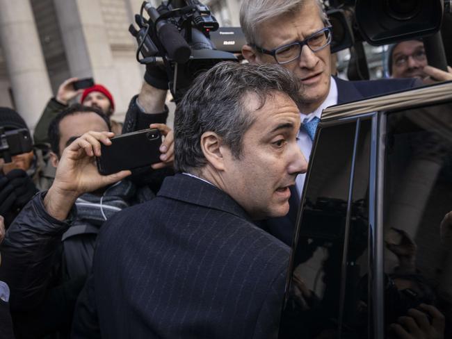 NEW YORK, NY - NOVEMBER 29: Michael Cohen, former personal attorney to President Donald Trump, exits federal court, November 29, 2018 in New York City. At the court hearing, Cohen pleaded guilty to making false statements to Congress about a Moscow real estate project Trump pursued during the 2016 presidential campaign.   Drew Angerer/Getty Images/AFP == FOR NEWSPAPERS, INTERNET, TELCOS & TELEVISION USE ONLY ==
