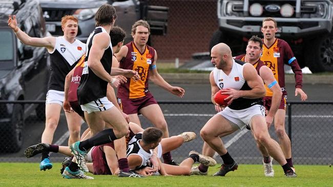 Stewart Crameri tries to weave his way through traffic earlier this season. Picture: Adam Cornell