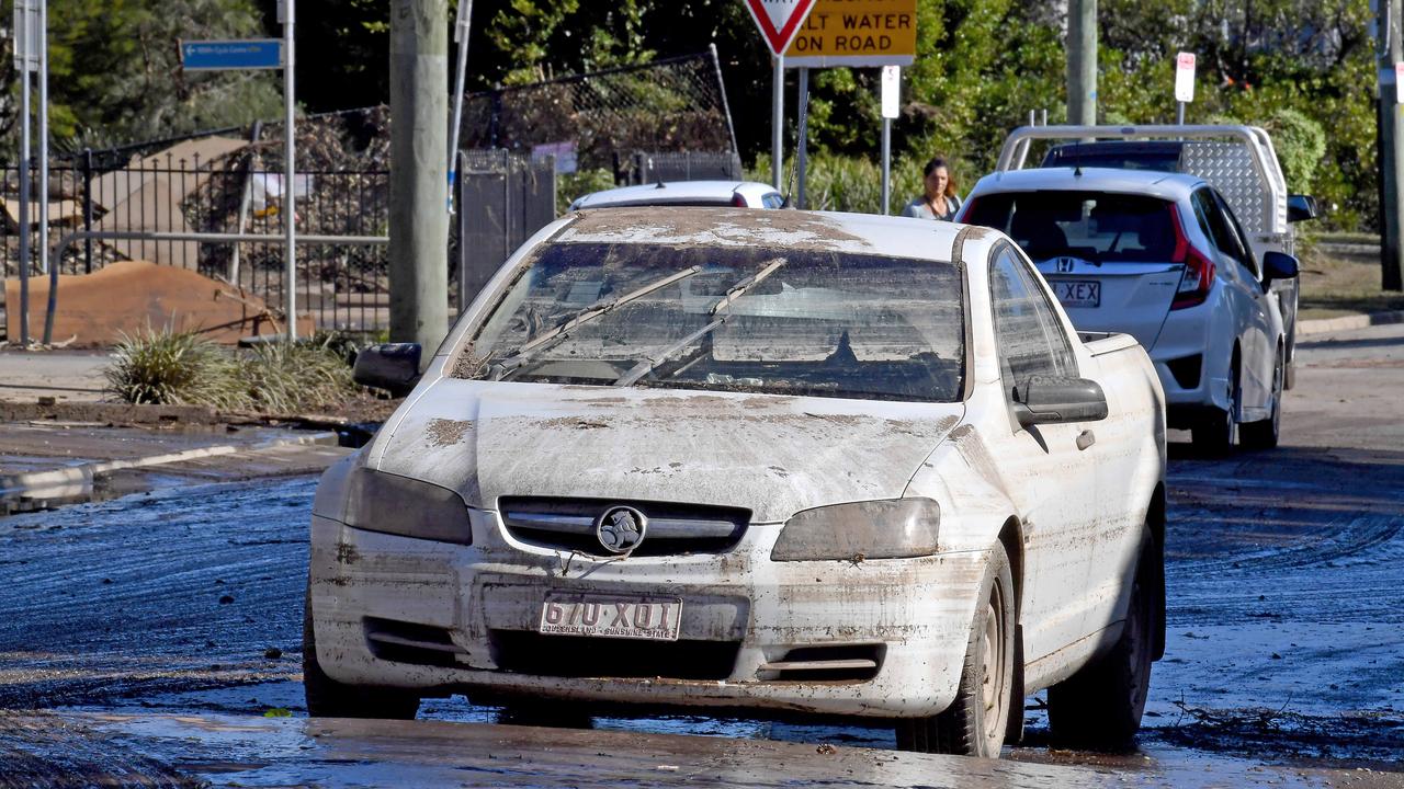 The mess and clean up in Windsor, Queensland. Picture: NCA NewsWire / John Gass