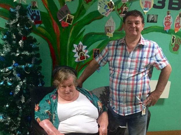 Former Taxi Council representative and Greek community leader Bill Gonis with his friend Mary, who he's helped get from the former Julia Farr Centre to spend Christmas with family for the past 14 years. Picture: Supplied