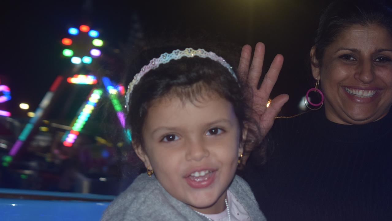 Gympie Show Friday 2021 - Raj Begeda enjoys one of the Show's many rides with her young daughter. Pictures: Josh Preston