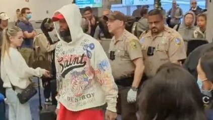 A video posted on Twitter showed Odell Beckham Jr being escorted by police after he was kicked off a flight in Miami on Sunday. Picture: Twitter/@TheMalibuArtist