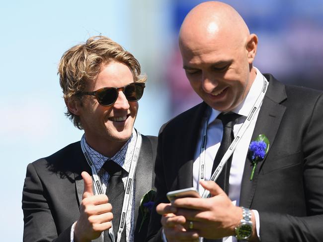 Rory Sloane and James Podsiadly celebrate Merchant Navy winning the Coolmore Stud Stakes on Derby Day. Picture: Quinn Rooney, Getty Images.