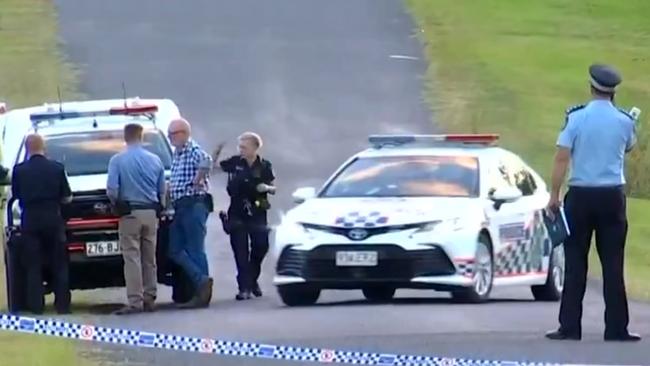 Investigators closed Running Creek Rd after the alleged incident. Picture: 7News