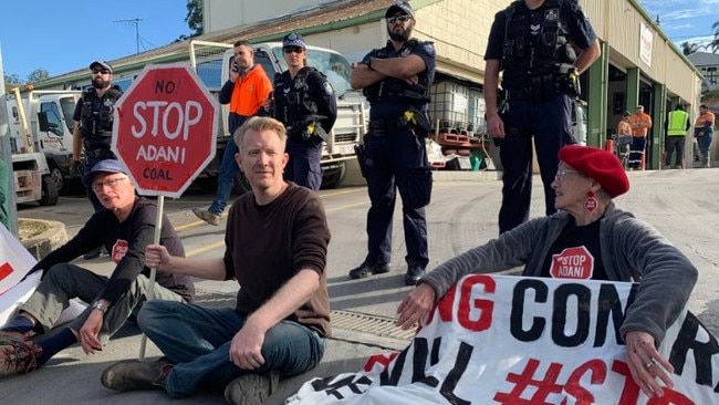 Police oversee a protest by Galilee Blockade protesters at a Brisbane concrete plant. Picture: Adam Head.