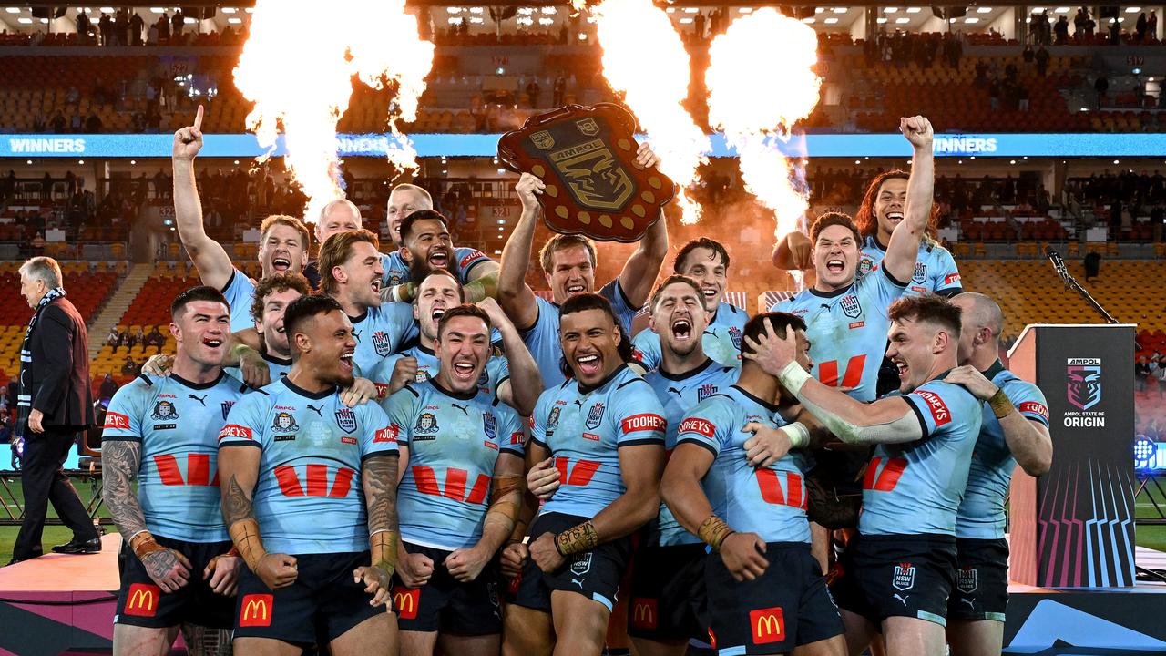 BRISBANE, AUSTRALIA - JULY 17: The New South Wales Blues celebrate victory after game three of the 2024 Men's State of Origin series between Queensland Maroons and New South Wales Blues at Suncorp Stadium on July 17, 2024 in Brisbane, Australia. (Photo by Bradley Kanaris/Getty Images) *** BESTPIX ***