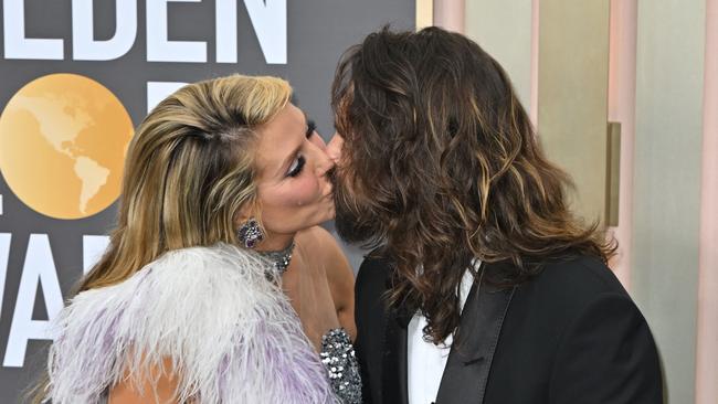 German-US model Heidi Klum and Tom Kaulitz kiss. Picture: AFP