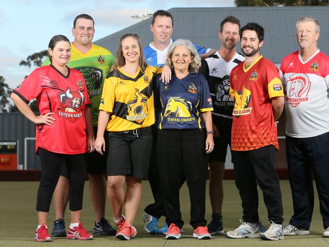 Laini Mcgorman (Eastern Raiders), Max Kleinig (Western Rogues), Cassandra Harvey (Heysen Comets), Mathew Short (Northern Knights), Renata Callisto (Central Chargers), Simon Dorr (Mallee Pirates), Ashley Whiley (Southern Blazers) and Ken Holtham (South Eastern Spartans) in team gear to launch lawn bowls’ new SA Super League. Picture: AAP/Emma Brasier.