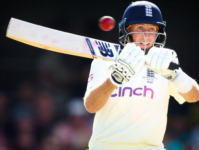 England's Joe Root bats during day three of the first Ashes cricket Test match between England and Australia at the Gabba in Brisbane on December 10, 2021. (Photo by Patrick HAMILTON / AFP) / -- IMAGE RESTRICTED TO EDITORIAL USE - STRICTLY NO COMMERCIAL USE --