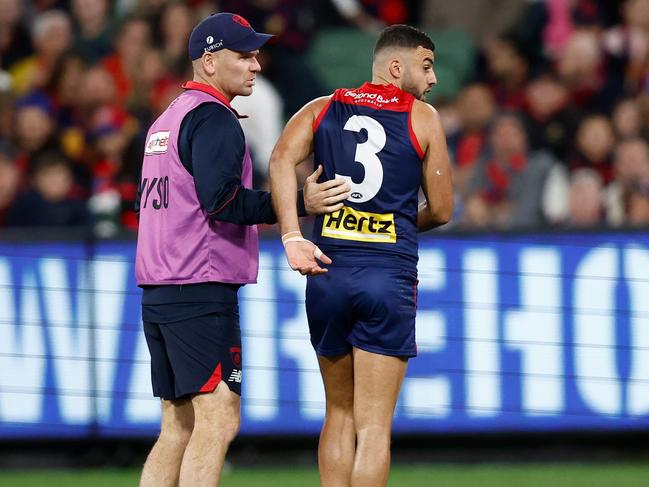 Christian Salem leaves the field with a hamstring injury. Picture: Getty Images