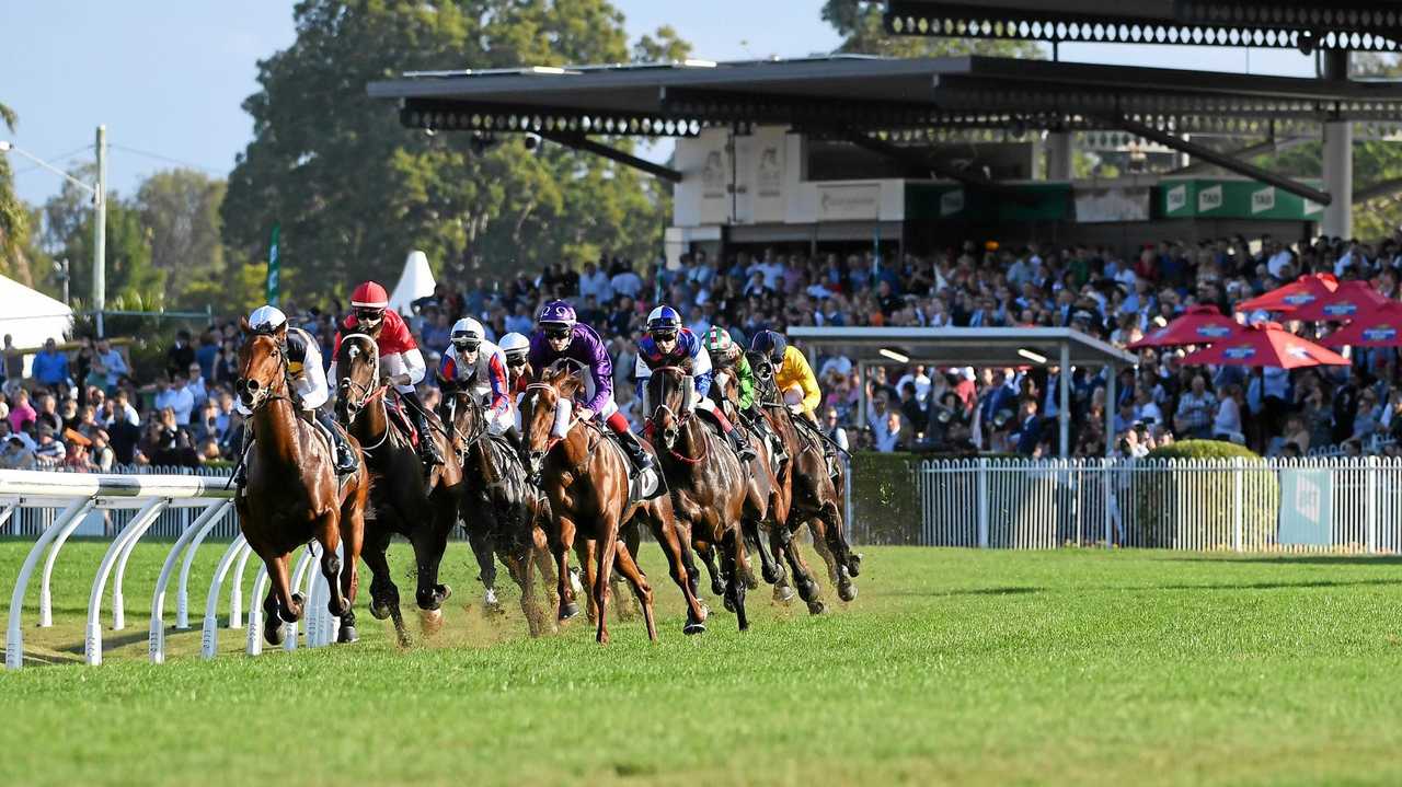 The massive crowd enjoys a memorable Ipswich Cup Day with friends and watching the racing. Picture: Rob Williams