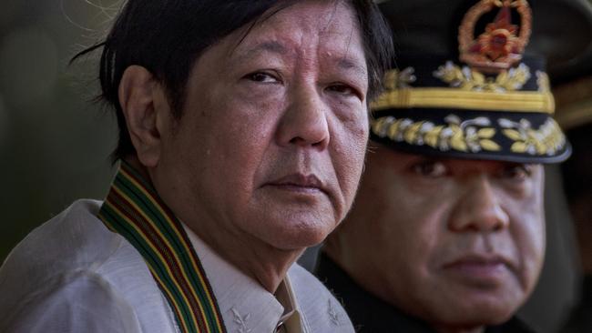 Philippine Armed Forces Chief of Staff, Romeo Brawner Jr, right, with the country’s President Ferdinand Marcos Jr at <span>the 126th anniversary of the Philippine Army in 2023. Picture: Getty Images</span>